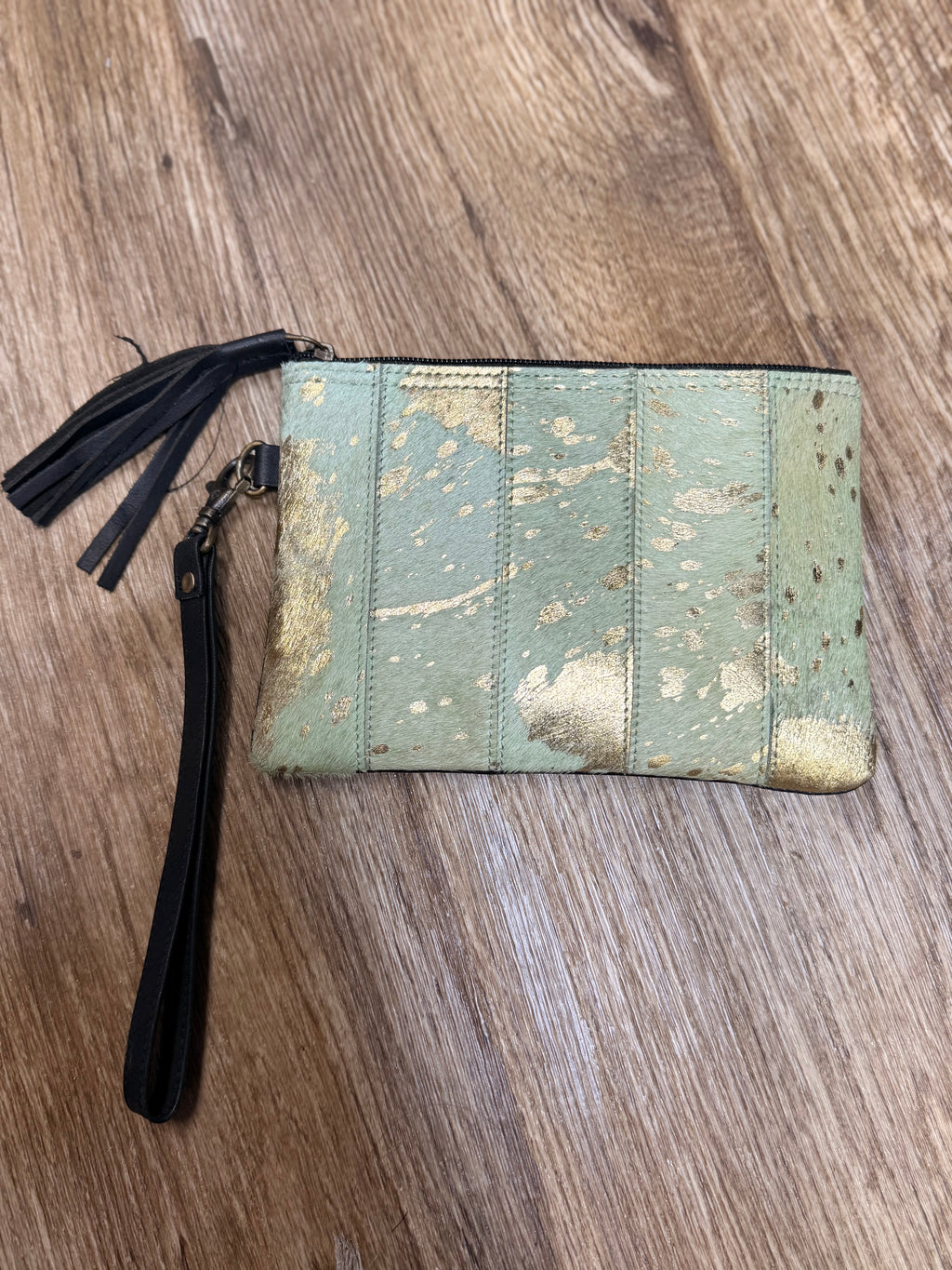 Genuine cowhide clutch with tassel