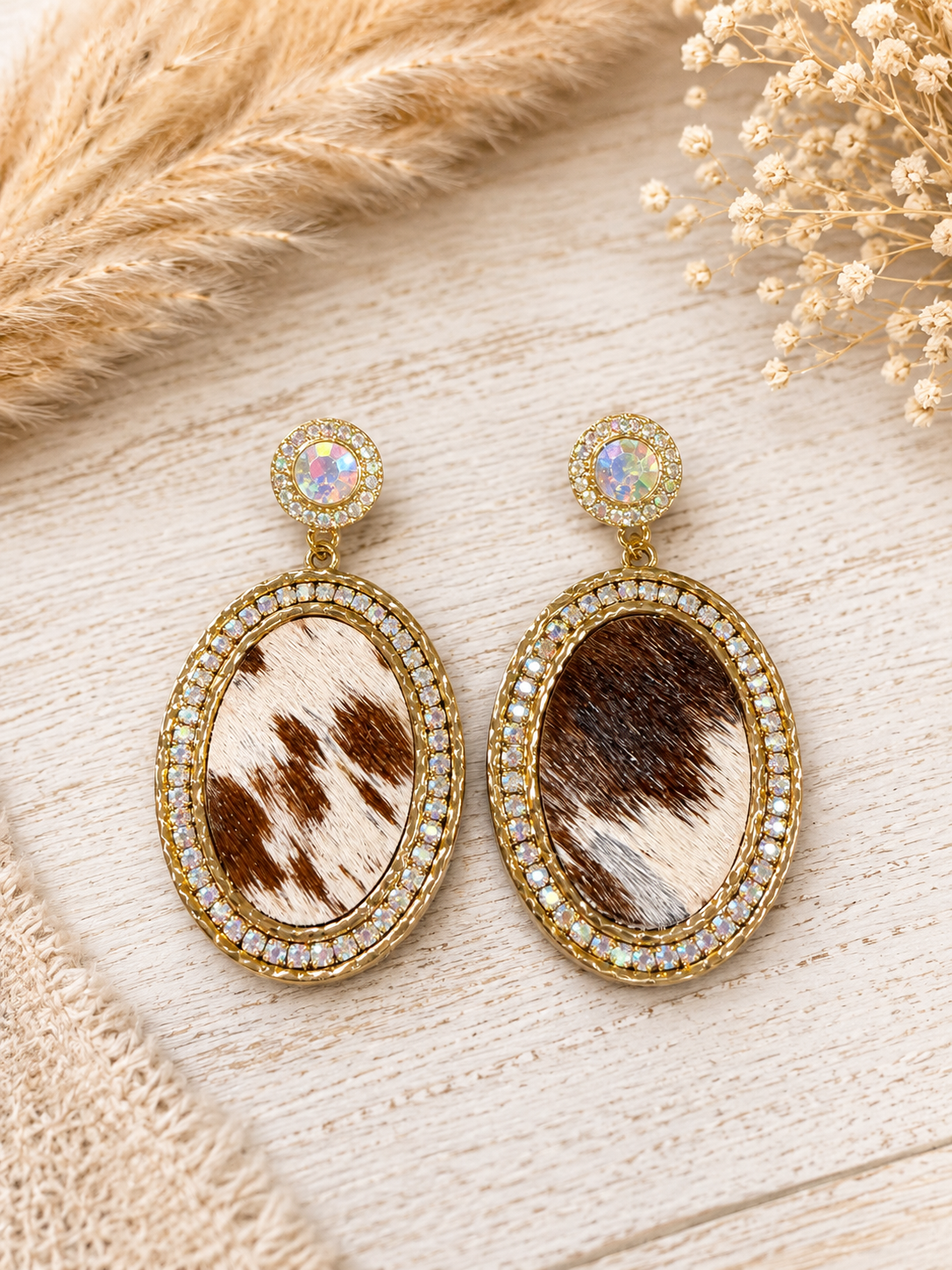 Gold rhinestone and cowhide earrings