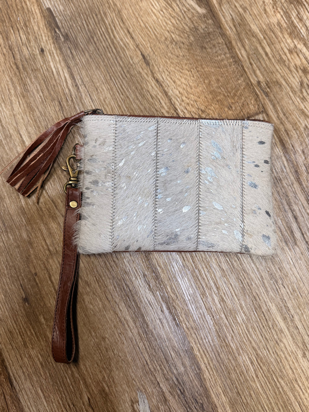 Genuine cowhide clutch with tassel