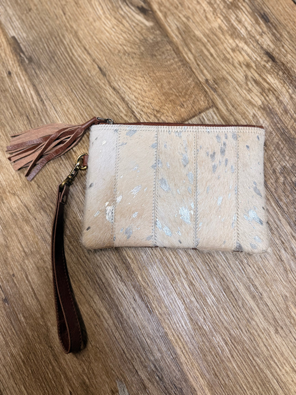 Genuine cowhide clutch with tassel