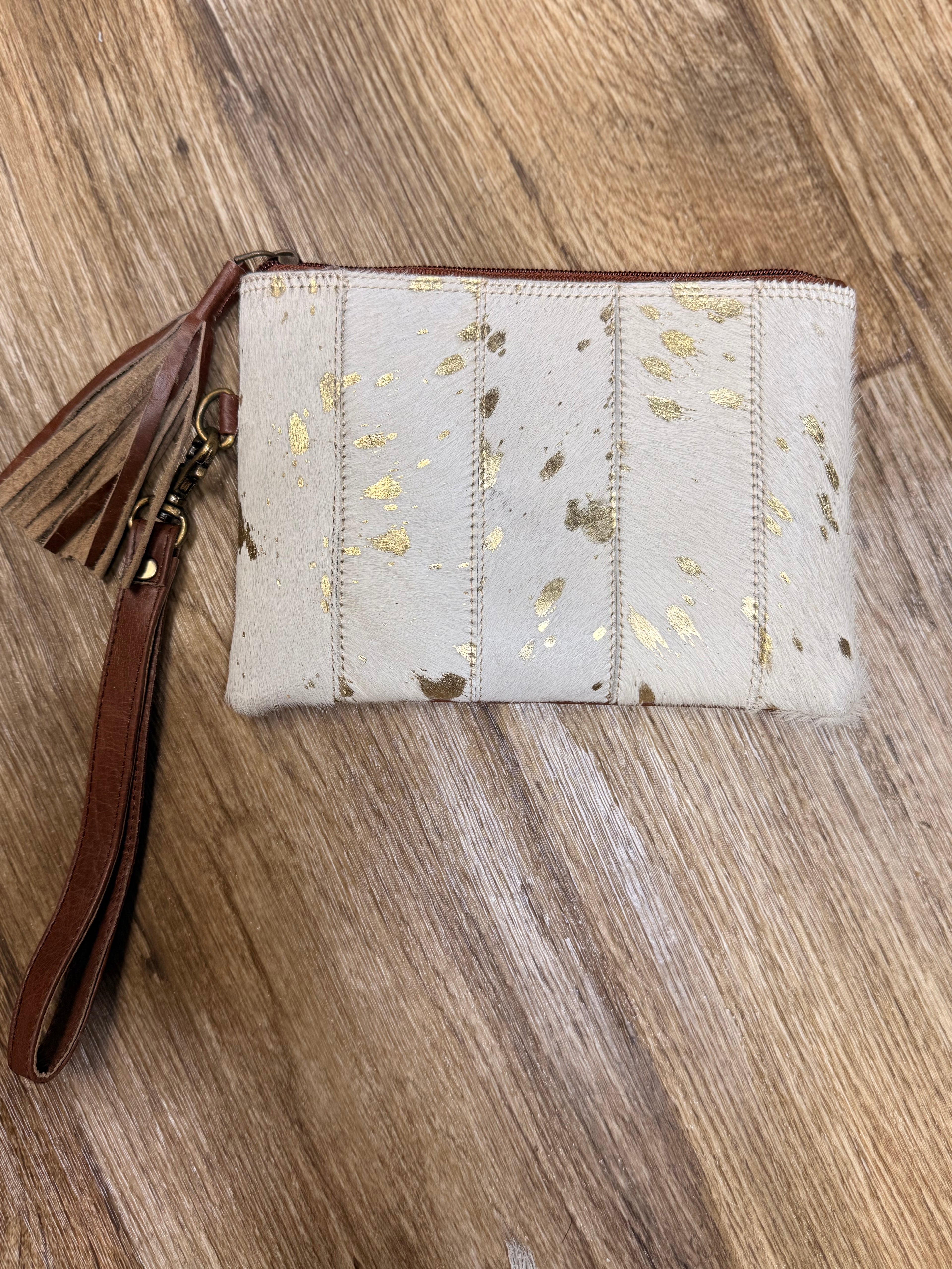 Genuine cowhide clutch with tassel