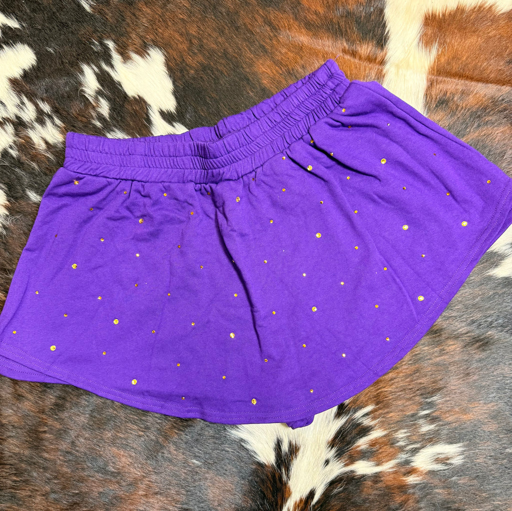 Purple skort with gold rhinestones