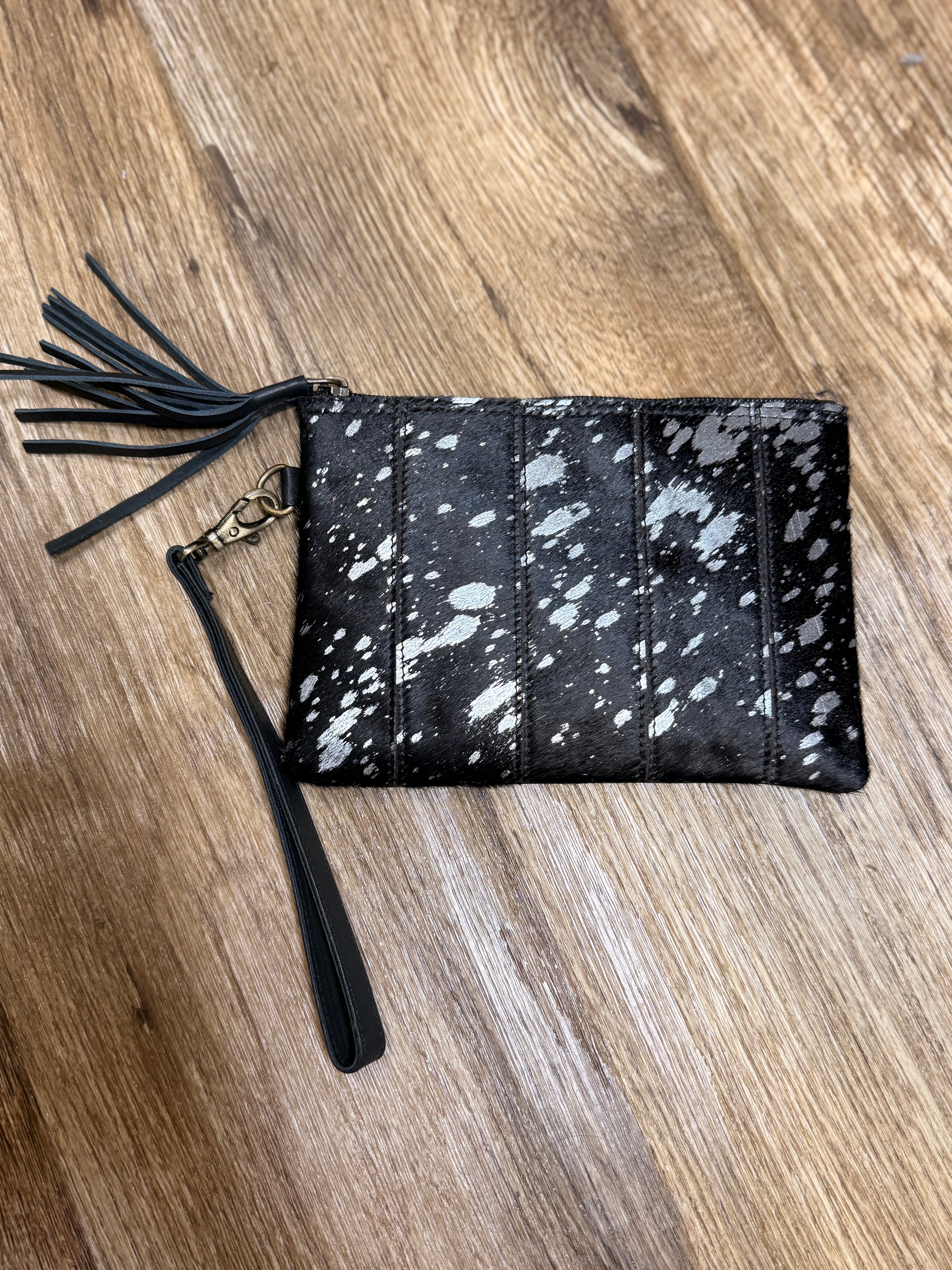 Genuine cowhide clutch with tassel