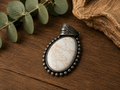 Lg. White and brushed silver pendant